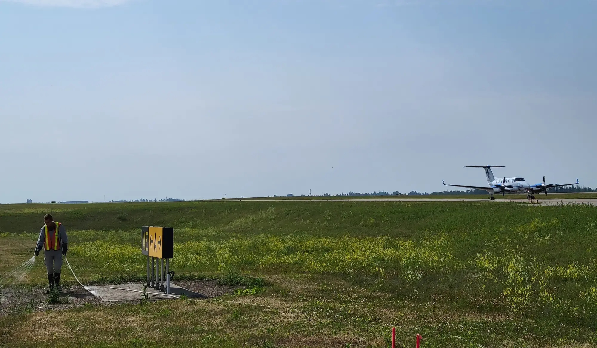 Industrial vegetation spraying at airport site