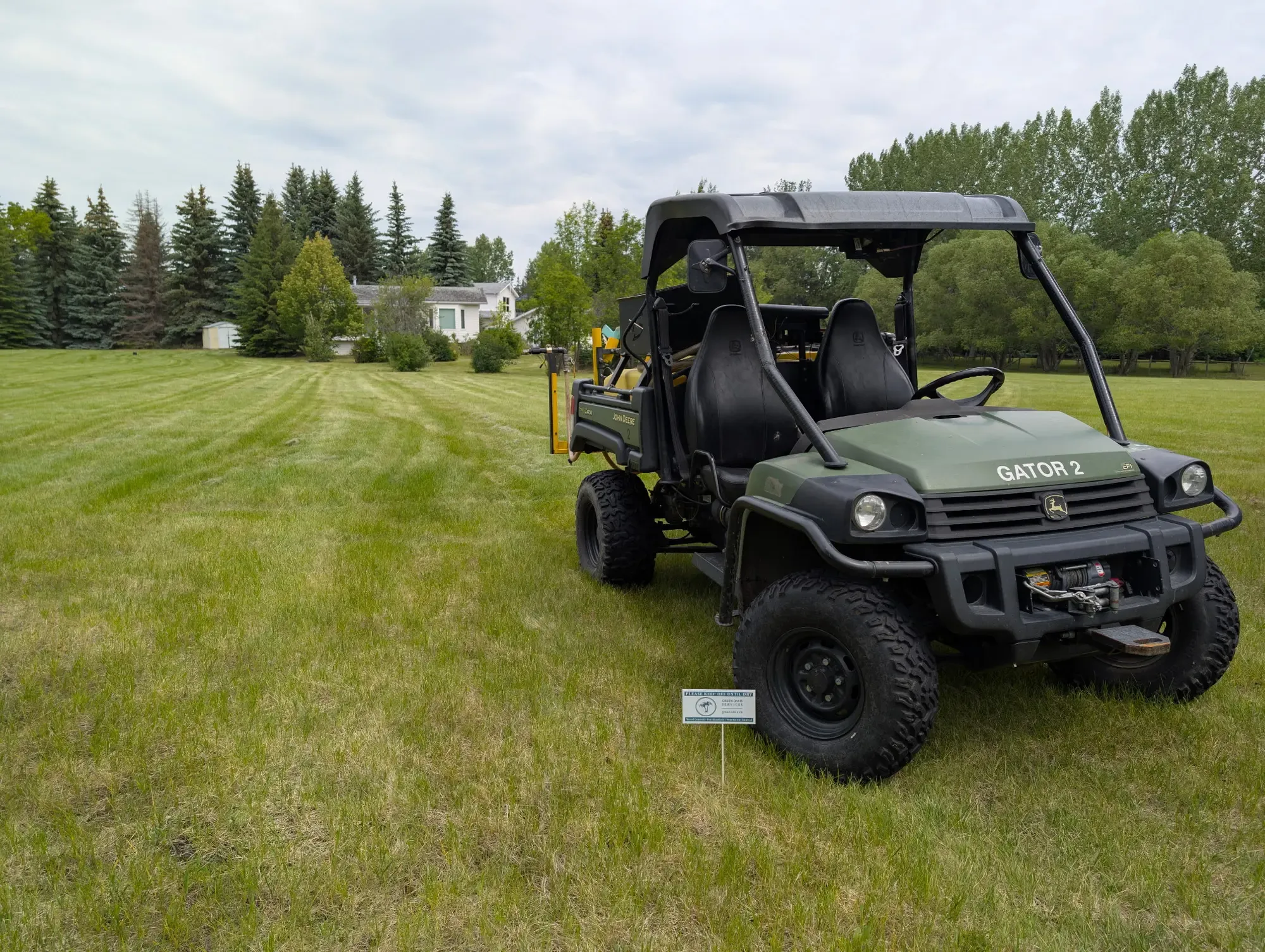 Green Oasis gator working on rural acreage property