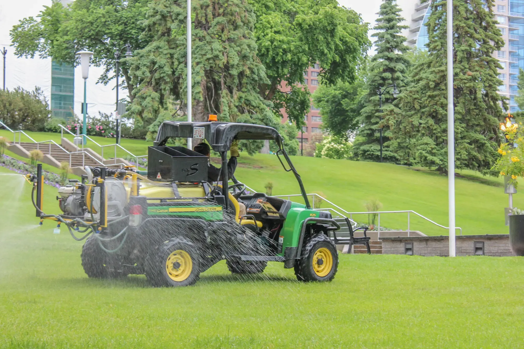 Green Oasis gator spraying at Alberta Legislature grounds