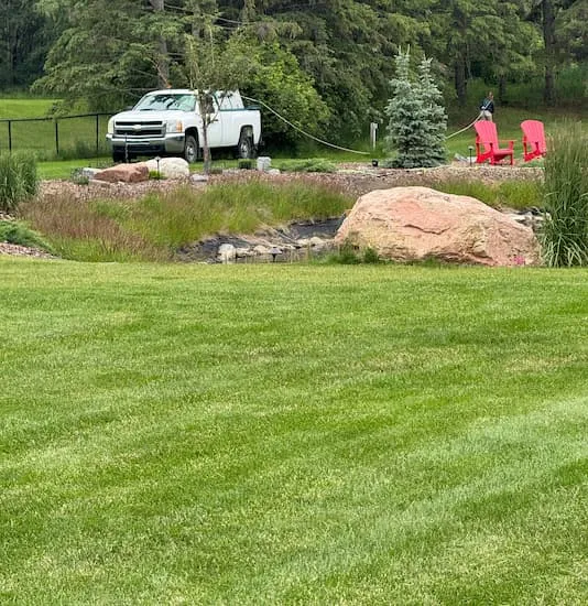 Green Oasis truck at luxury residential property