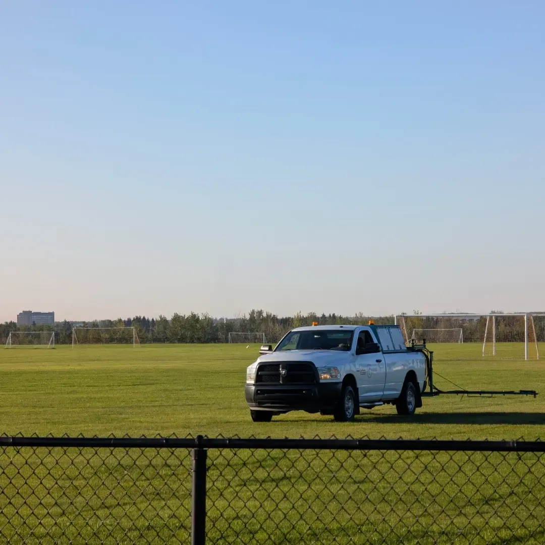 Green Oasis truck treating sports field